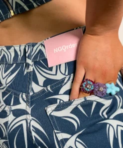 New Girl Order TATTOO DENIM CUT OUT FLARES